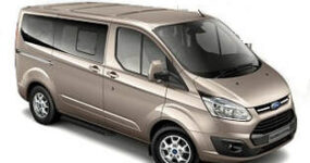A gold Ford Transit Tourneo minivan.